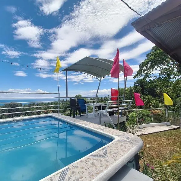 Island samal overlooking view house with swimming pools，位于San Antonio的酒店