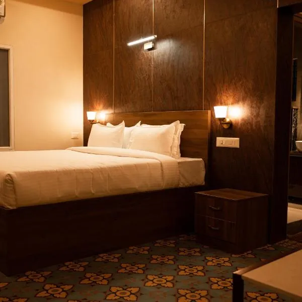 Poojaris Nirantara - Mysuru, hotel in Hampāpura