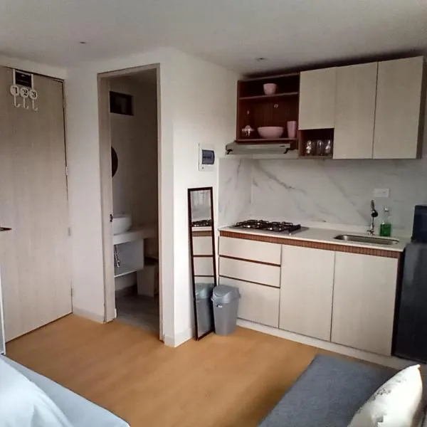 Homy Apartamentos - Deluxe, hotel in Bogotá