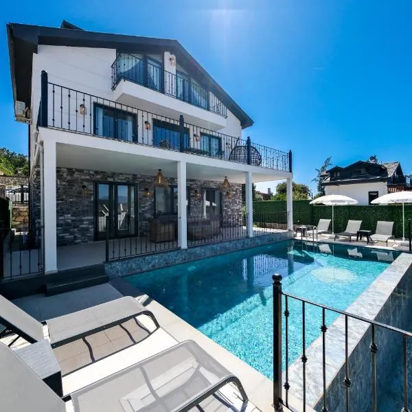 Oasis Family-Friendly Luxury Villa Hisaronu, Ovacik by Sunworld Villas Fethiye, hôtel à Fethiye