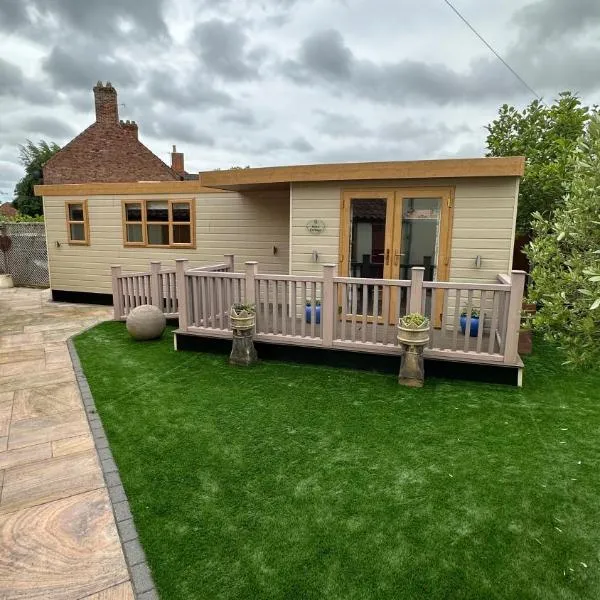 Rose Cottage at Orchard House, hôtel à Rampton