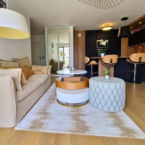 Sublime appartement 4 étoiles neuf T3 àPuteaux 61m2 proche La Défense, 10m2 de terrasse avec magnifique vue, hotel in Puteaux