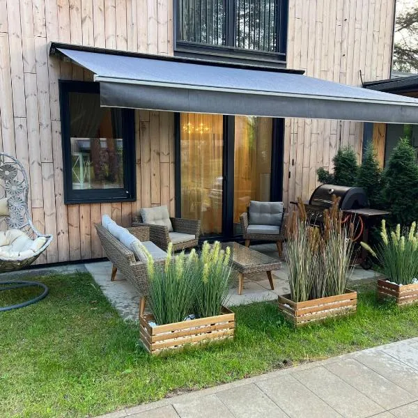 Seaside apartment Albatross Home Resort Mēnesdārzs, hotel in Ķesterciems