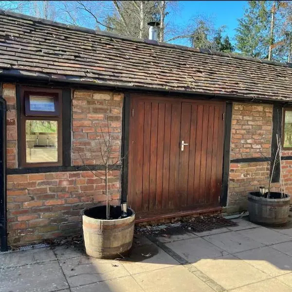 Cottage in Jacobean Farmhouse grounds、テンベリーのホテル
