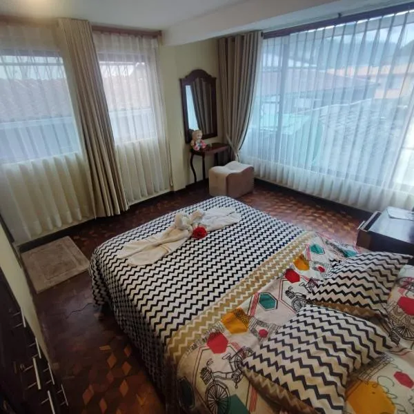 MATRIMONIAL TURI centro de la ciudad, garaje, hotel en Baños