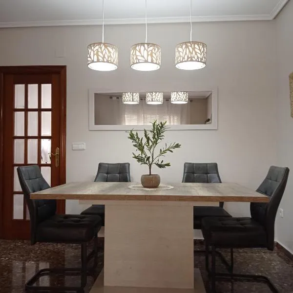 Feriado, apartamento con parking incluido, hotel en Cella