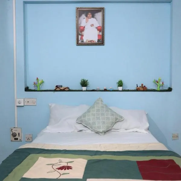 Good Vibes Home stay, hotel en Puttaparti