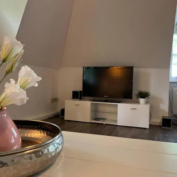 Föhrzeit Wohnung 3 Kuschelig unter Reet mit Garten, ξενοδοχείο σε Borgsum