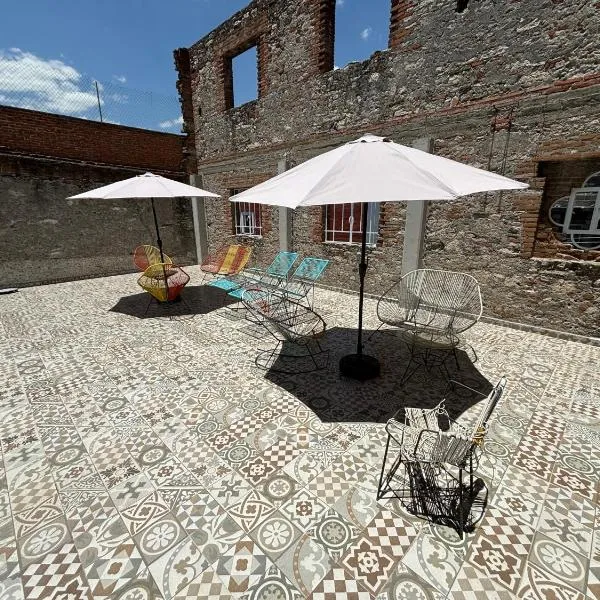 Hostal Casa De Arcos, hotel v destinaci Puebla