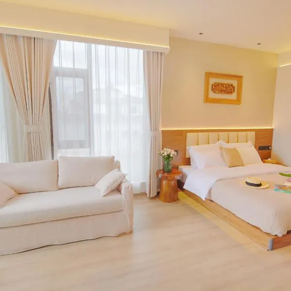 夕露小榭南门机场大巴店Xiluxiaoxie MUXIN INN, hotel in Lijiang