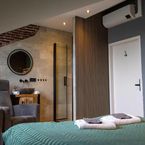 Zeeschelp - Comfortabele kamer bij B&B Gezond aan Zee - Toegang Wellnesstuin meerprijs, hôtel à Ouddorp