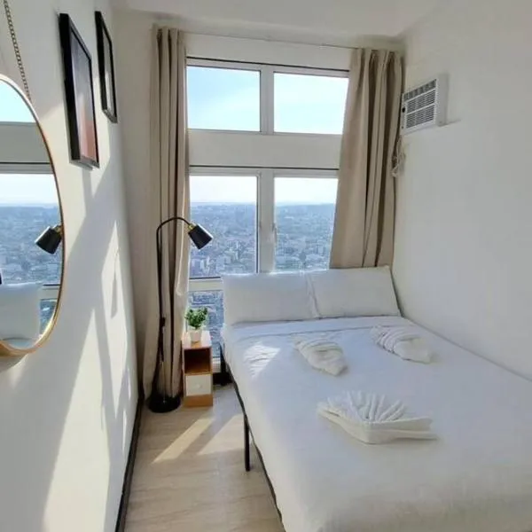 Cozy 1 BR San Lorenzo Place Netflix 4KM NAIA, hotel in Manila