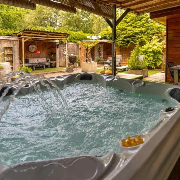 Drents Genieten - Ericaheide met privé sauna en jacuzzi, hôtel à Erm