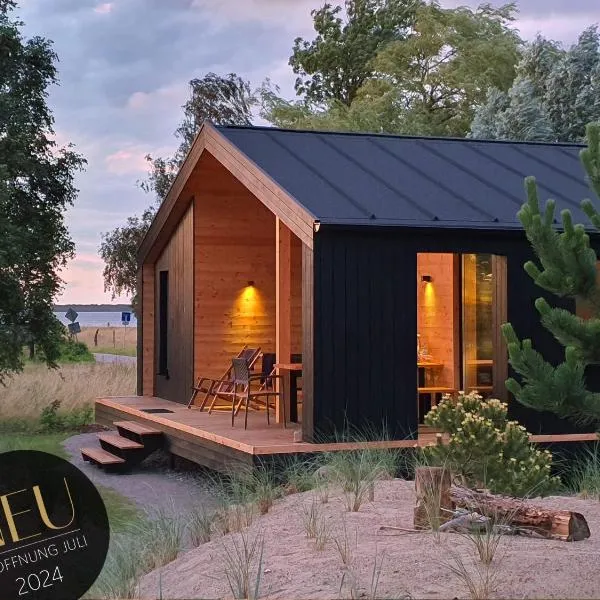Werder Chalet -- GROßES SONNENDECK -- Strand 150m I Sauna I eKamin I bis 8 Pers I Meerblick I by "Meyers am Meer", hôtel à Boiensdorf