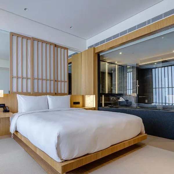 Boutech Wuri Village Hotel, hotel en Wuri