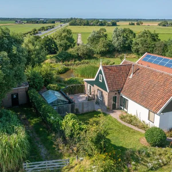 Gastsuite het Duinroosje met hottub op het privé terras!, hotel in Den Burg