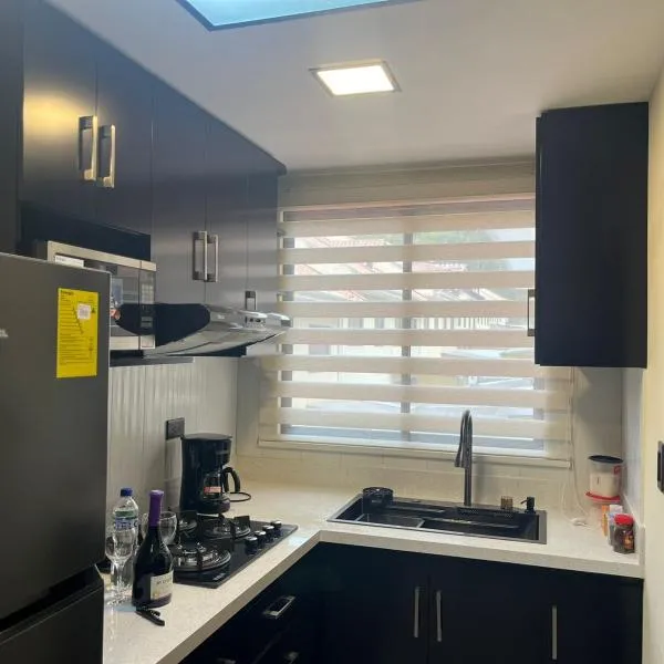 Departamento de 2 Habitaciones, full amoblada con todo para que disfrutes de tu Estancia, Hotel in Cuenca