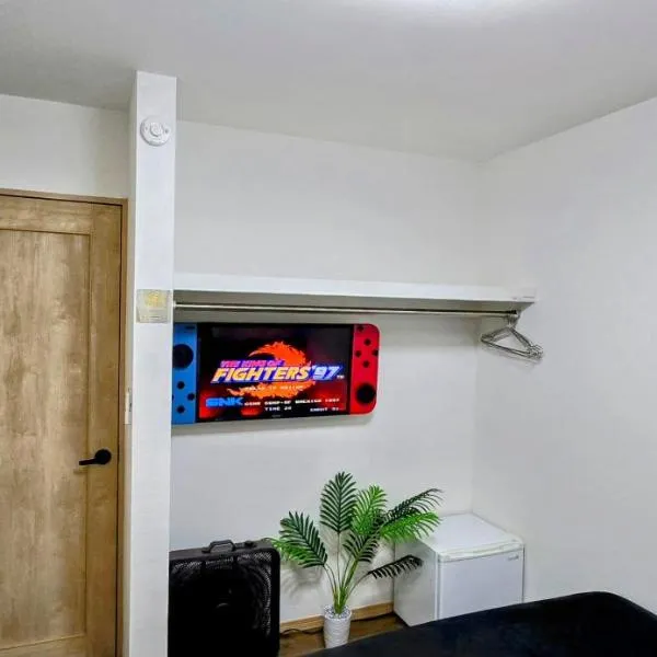 家主居住型ゲストハウス龍の椅子-宿と空港送迎と滞在中の運転と撮影係付き, ξενοδοχείο σε Haebaru