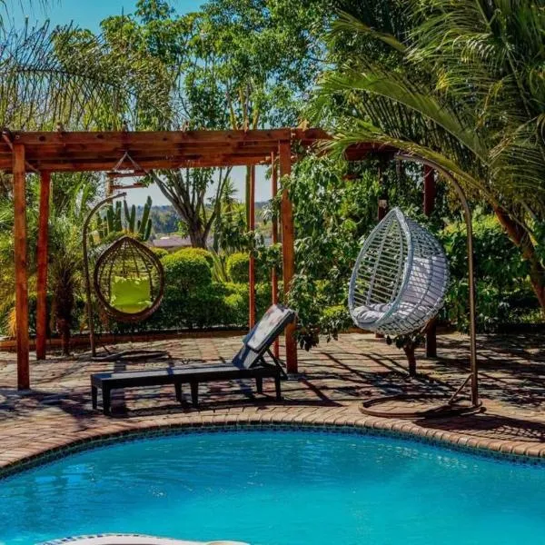 The Olympus Zim with 5 beds baths and pool, hotel in Bulawayo