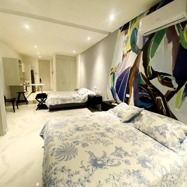 Espectacular apto Loft NUEVO- Frente al Hilton Pozos Colorados, hotel en Santa Marta