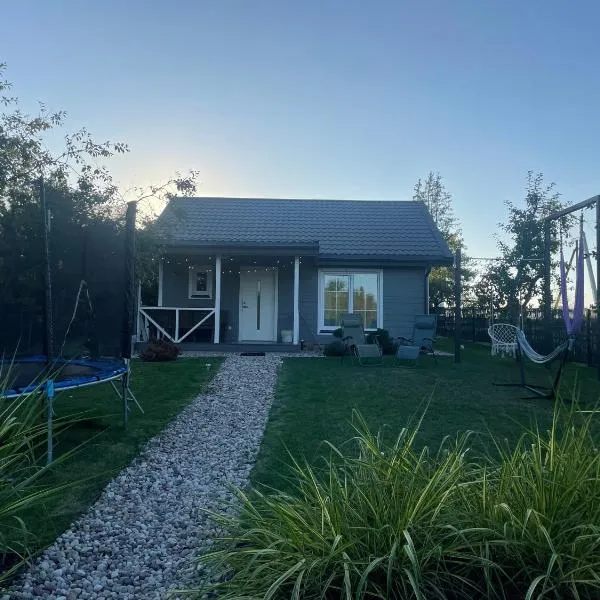 Cozy holiday house with sauna and entertainment, hôtel à Puskelniai