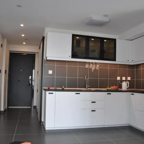 Jona's Appartement, готель у місті Zhufutun