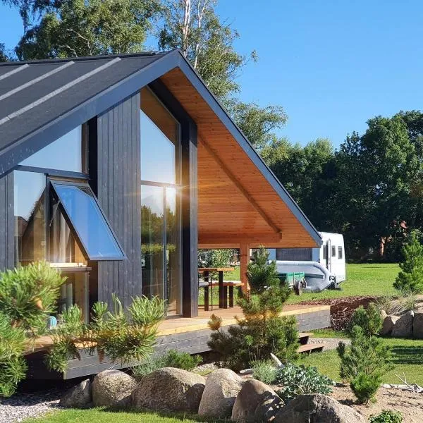 Werder Chalet -- L I E G E P L A T Z -- Ostsee Strand 150m I Sauna I eKamin I Ferienhaus an Ostsee bis 8 Pers I by "Meyers am Meer", hotel in Boiensdorf