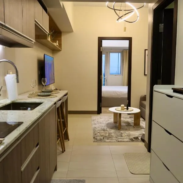 Park Mckinley West 1BR, hotel in Manilla