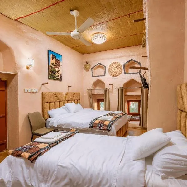 Manazil Inn نزل المنازل, מלון בניזווא