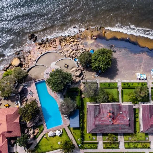 Sigelege Beach Resort โรงแรมในSenga