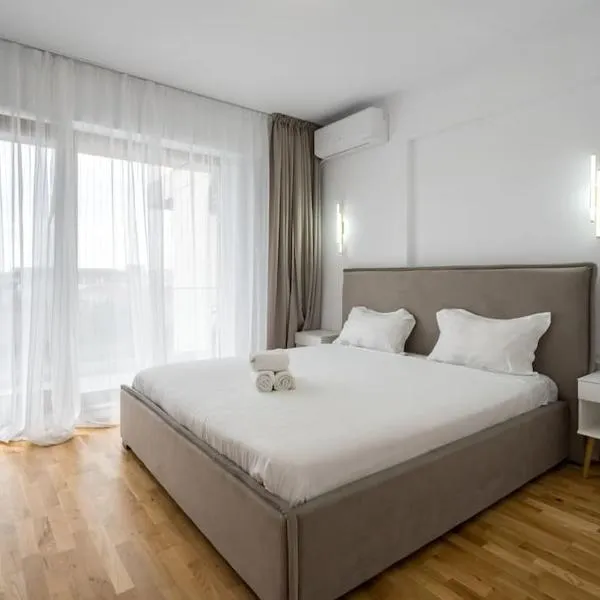 The WHITE - Family Escape - Loft, hotel din Voluntari