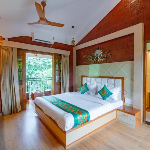 Treebo Green Village Resort with Pool, Goa, hôtel à Maneri