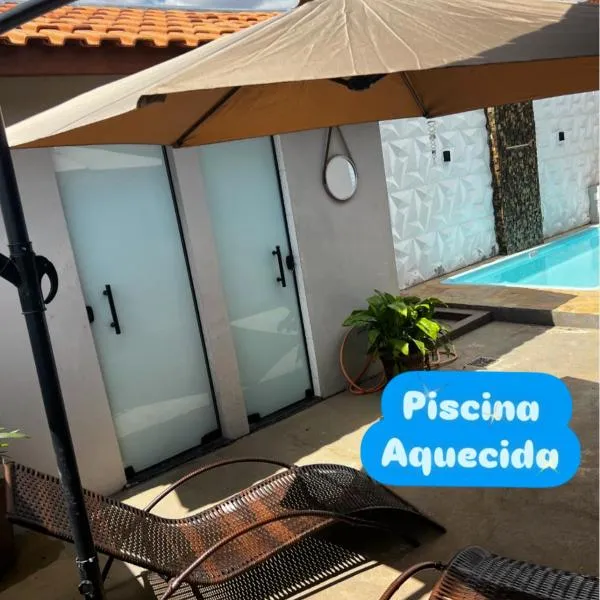 Casa de campo, piscina climatizada Próx a feira de malhas em Socorro SP, hôtel à Socorro