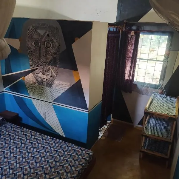 Chez Yaya, chambre bleue, готель у місті Oussouye