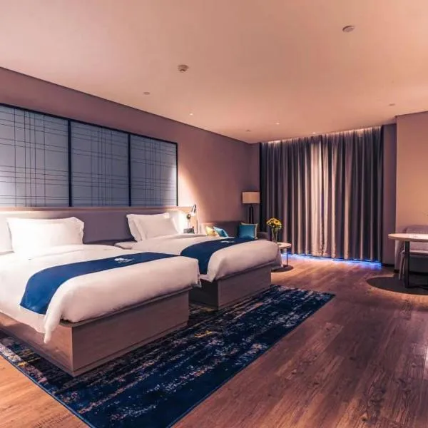 Echarm Hotel Fujian Hongtuo Central City, hotel v destinaci Tengcheng
