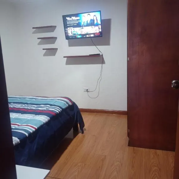 Habitación en departamento, hotel en Cuenca