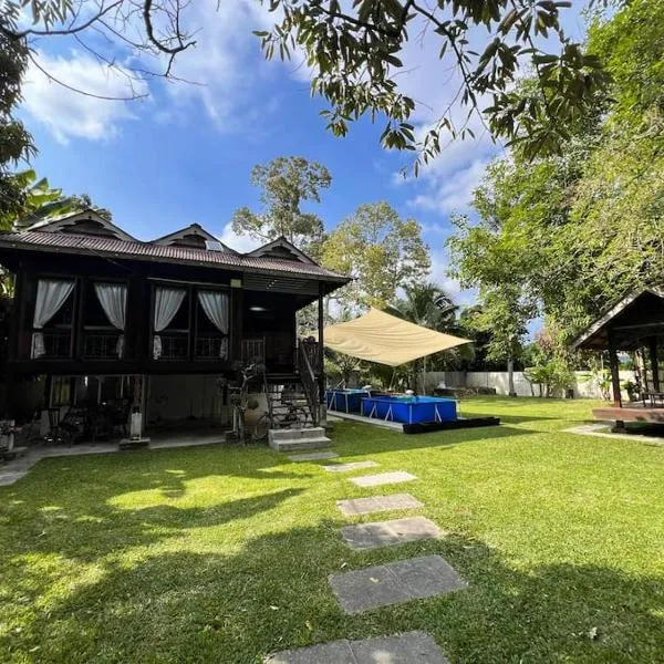 Merpati Dusun Retreat, מלון בKepala Batas