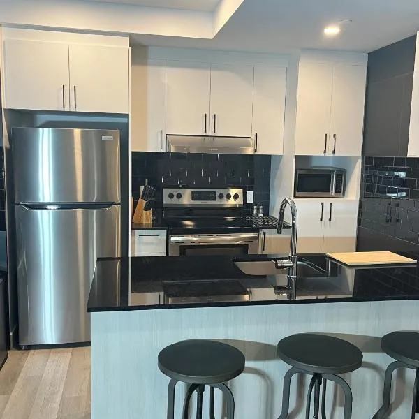 Joli condo en basse-ville - Parking gratuit 309357, hotell i Québec