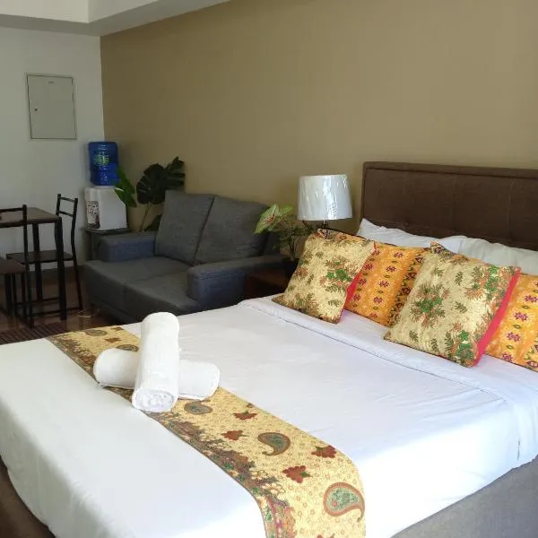 Cozy & Stylish Stay - Abreeza Mall - Pool - WiFi - T2-2312, hotel in Davao City
