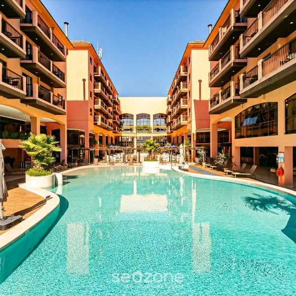 Resort pé na areia - Suítes JBVTOP, hotel em Florianópolis