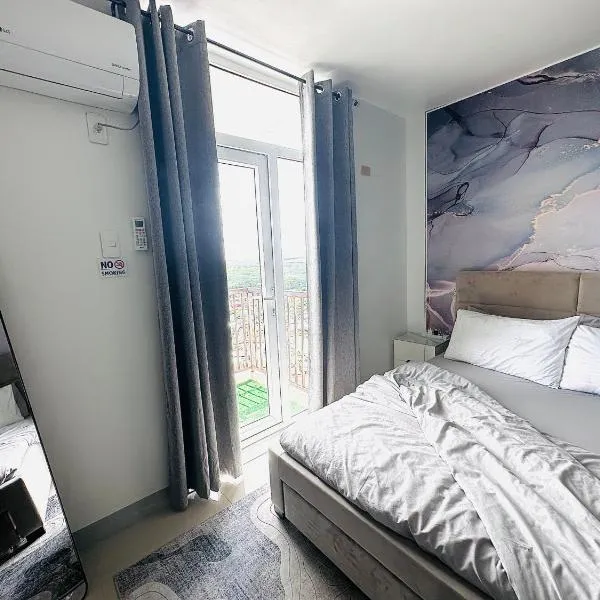 Affordable Condo with Fast Wifi & Near Airport, hotel in Lo-oc