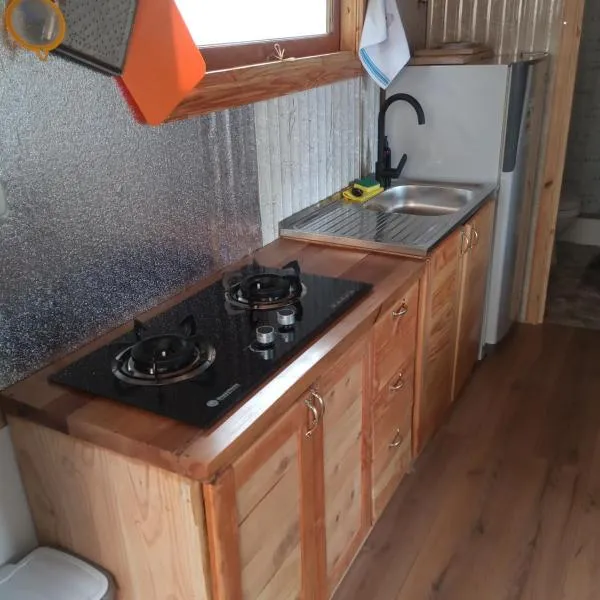 Departamento 2 villa la dehesa, готель у місті Нельтуме
