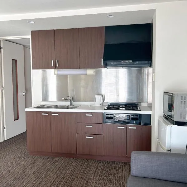 山中ビル3Fーワンフロア貸切48平方メートルone floor private room, hotel em Warabi