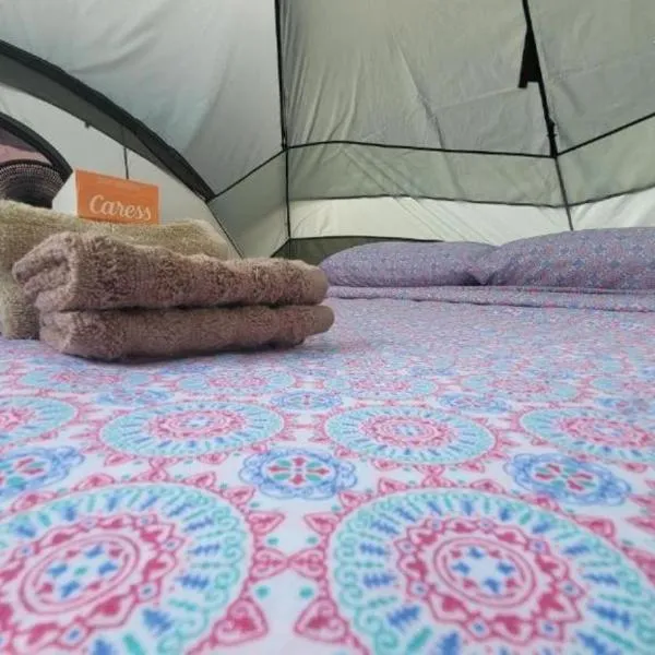 CRASH n SAVE -RENT 10FT TENT STAY AT COZY GLAMPING CASH ONLY -MI CASA TU CASA CAMPSITE w Queen Bed-Huge Shower-Shadowed FRUITS Garden - 5 Min Walk to Biobay Stations -Restaurants -Beaches -BIOLOGIST FAMILY SECURITY VACATION HELPERS, отель в городе Вьекес