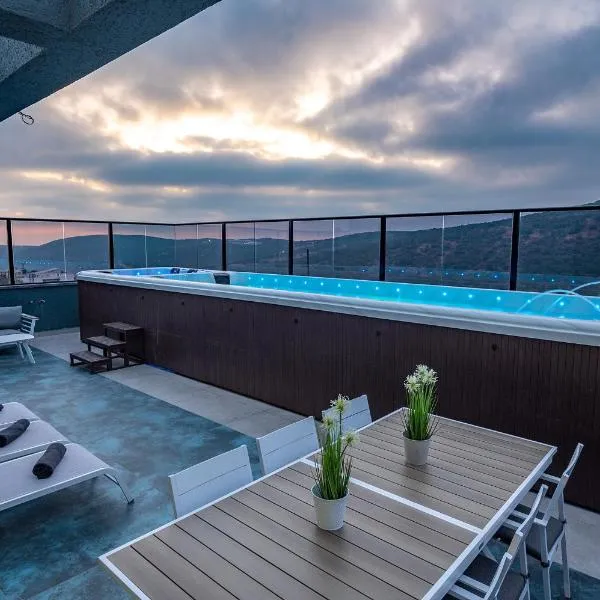 Naomi Boutique Suites, hotel en Netu'a