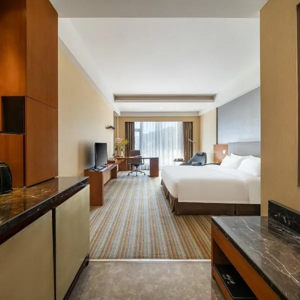 Juntai Hotel Xiamen, хотел в Сямън