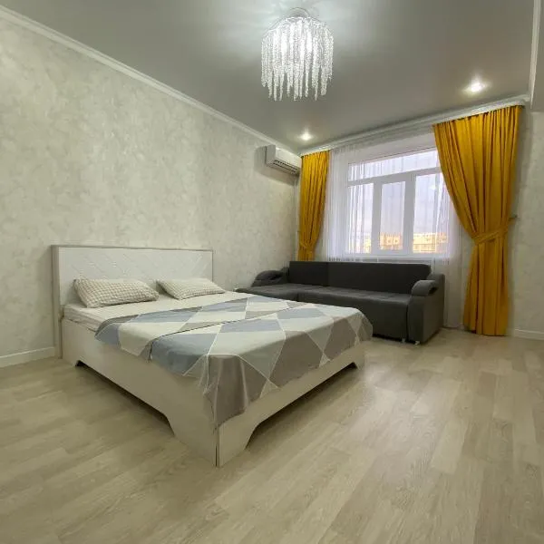 Уютная 1-ком кв в Жк Золотой квартал мкр Батыс-2, hotel in Aktobe
