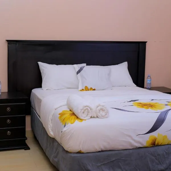 Dreamy Den Suites Kiwatule, hotel v destinaci Kampala