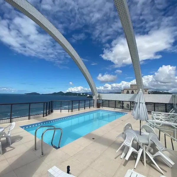 Flat em frente ao mar com piscina varanda e AC, hotel v destinaci Santos