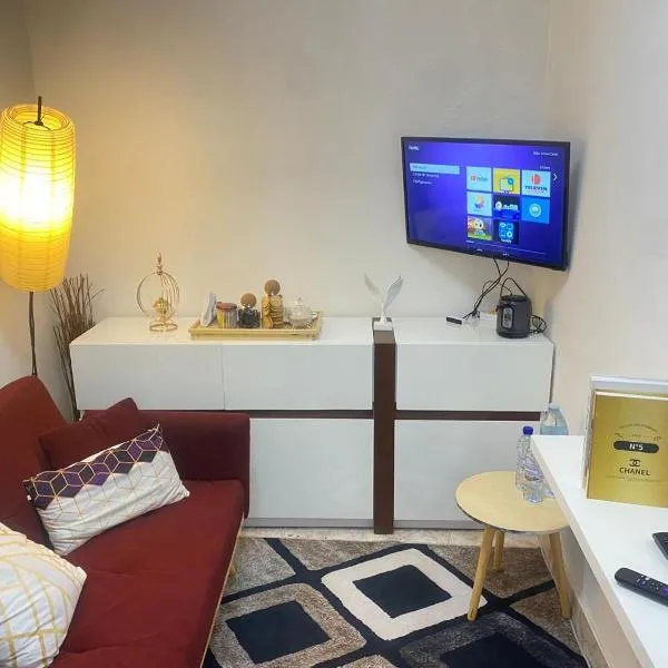 Quarto salinha e WC, hôtel à Lubango